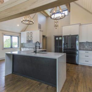 Open Kitchen With Waterfall Island