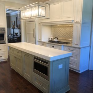 Colored Island With White Kitchen