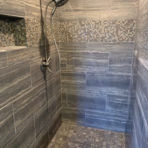 Spacious Stone Shower Remodel