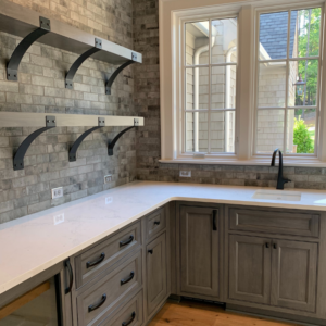 Cabinets with Built-In Beverage Fridge and Open Shelving