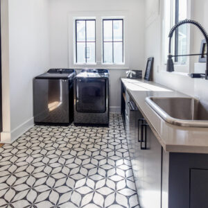 Contemporary Laundry Room with Patterned Tile
